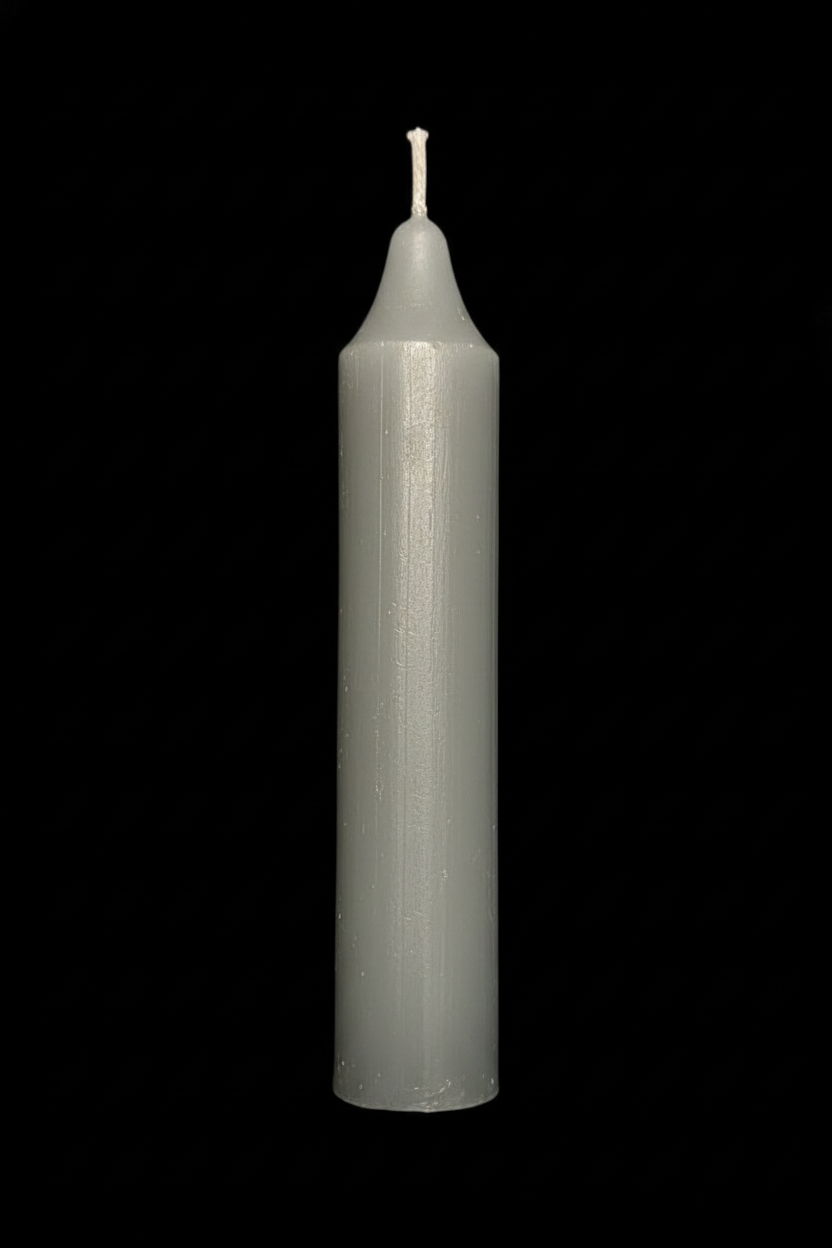 Light grey coach candle on a black background