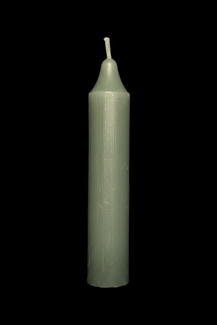 Green coach candle on a black background